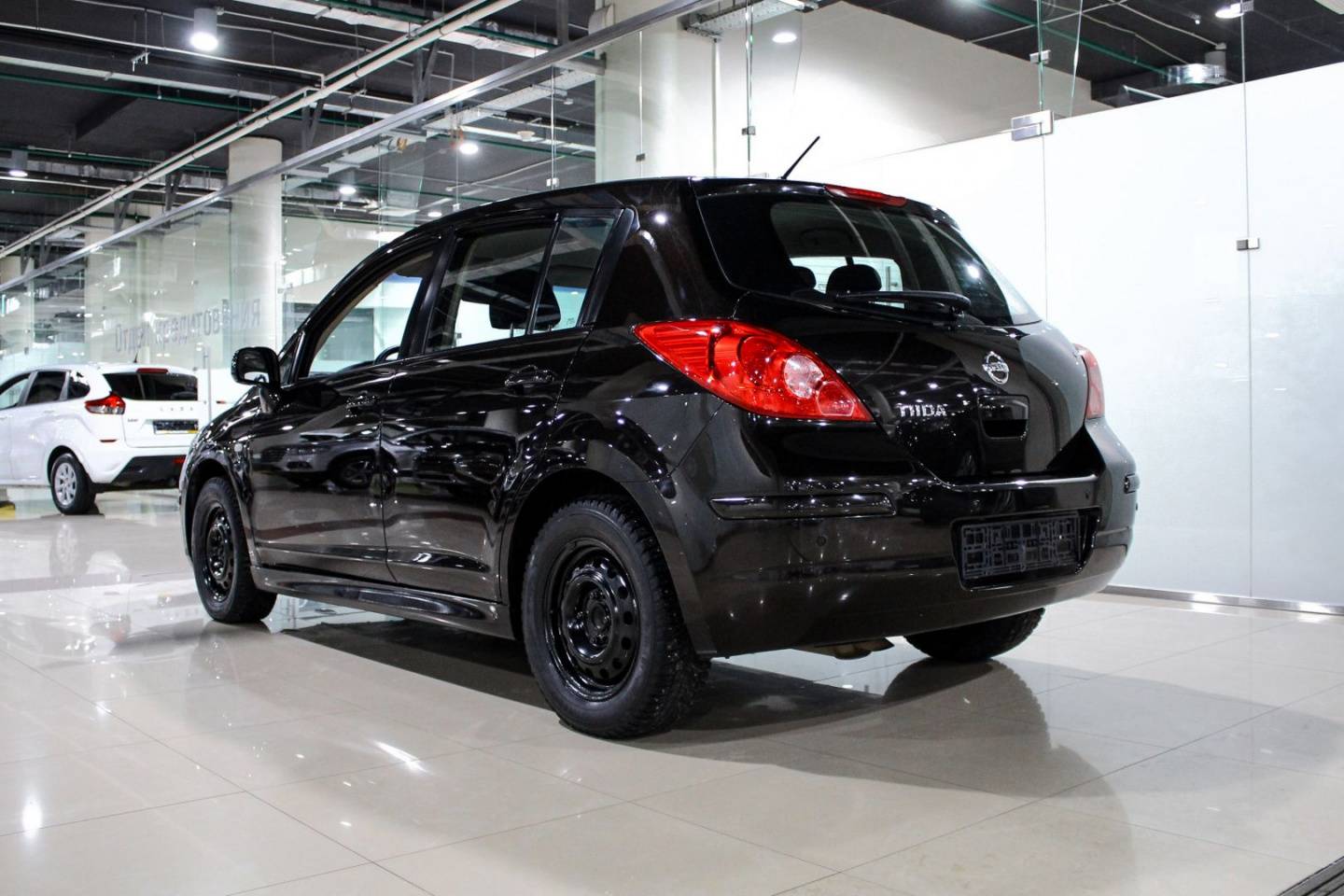 Купить Tiida с пробегом